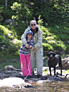 Dad and Karyn searching for the elusive trout while a loyal four legged friend stands guard...